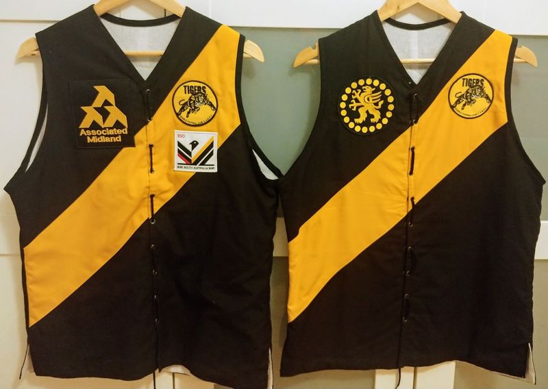 File:Reproduction 1986 and 1980 laceup guernseys.jpg